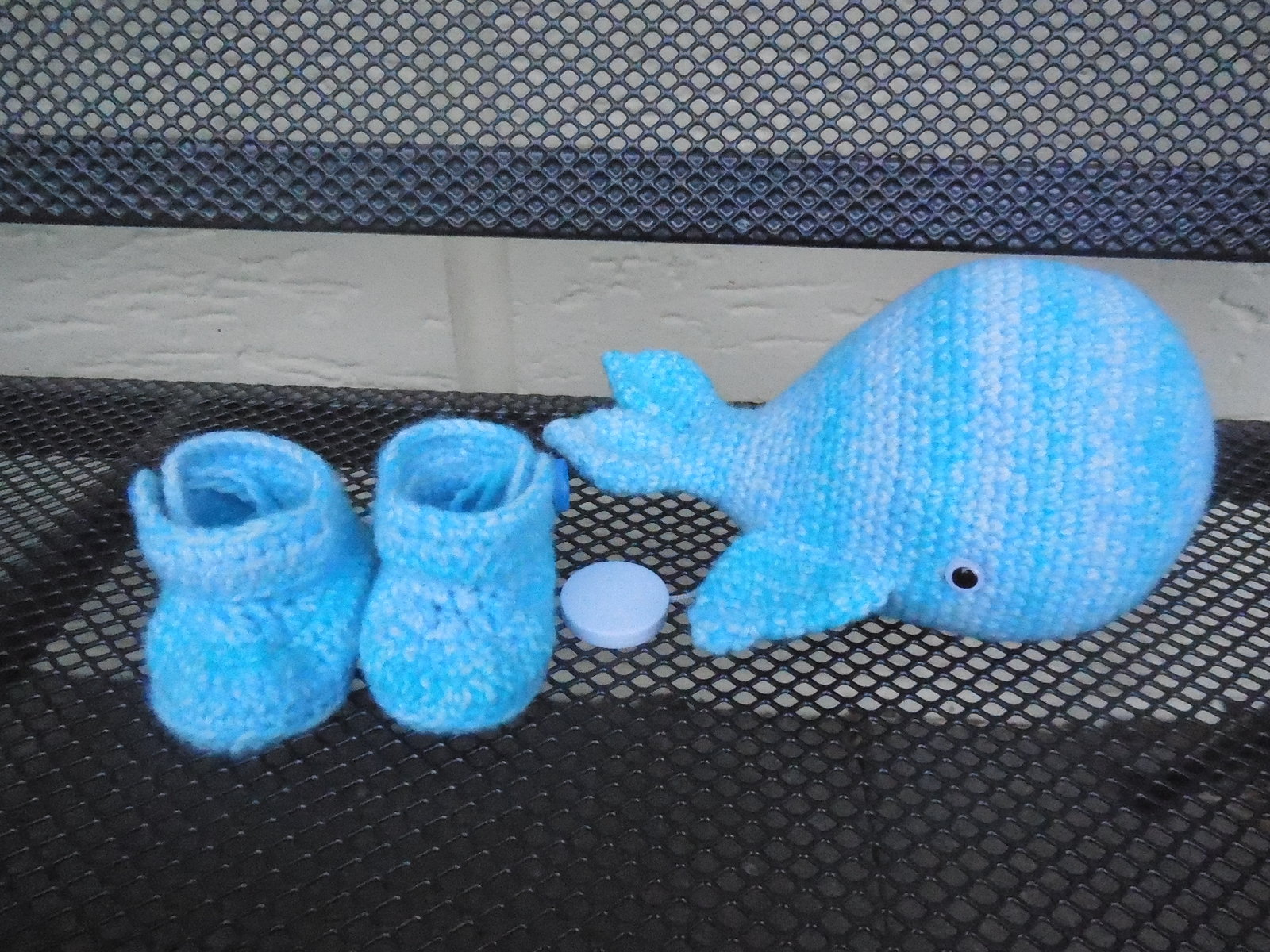 Spieluhr und Babyschuhchen werden verschenkt